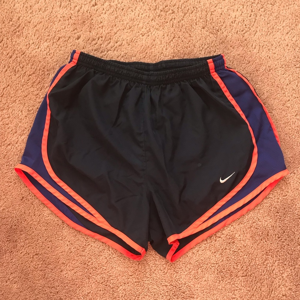 navy blue Nike Tempo shorts